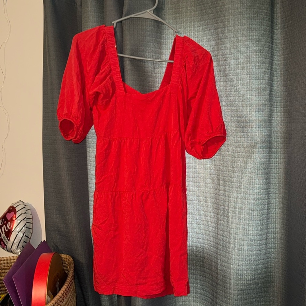Super cute red, square neck dress, with half length sleeves.